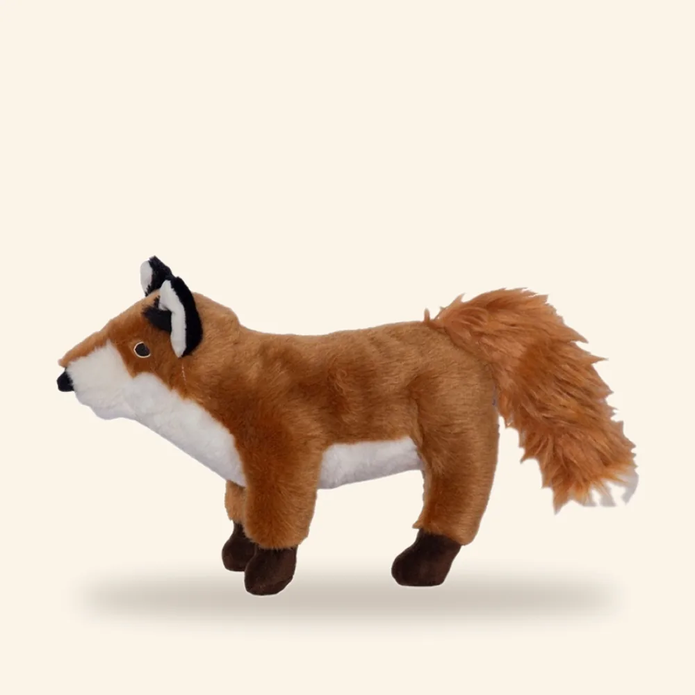 Peluche realista sentado para perro