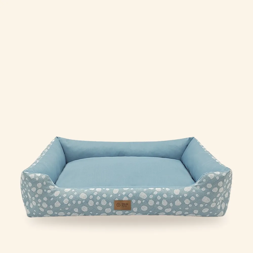 Cama estampada con bordes para perro