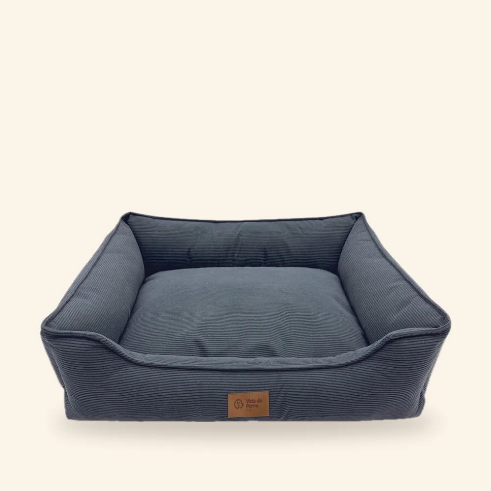 Cama rectangular con bordes de pana para perro