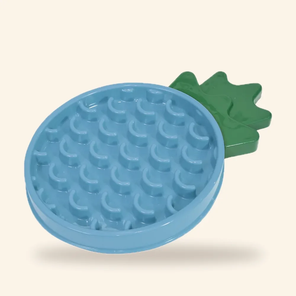 Alimentador lento en forma de piña para perro